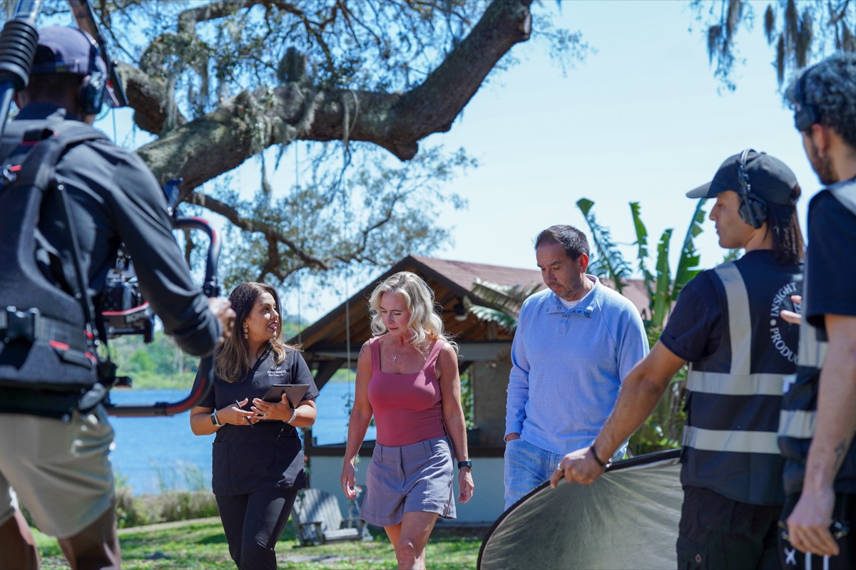 Filming an outdoor interview by the lake